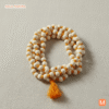 ge of the authentic Tulsi Jaap Mala, from the Jaap Sadhana Combo, with white and orange beads and an orange tassel, on a light background